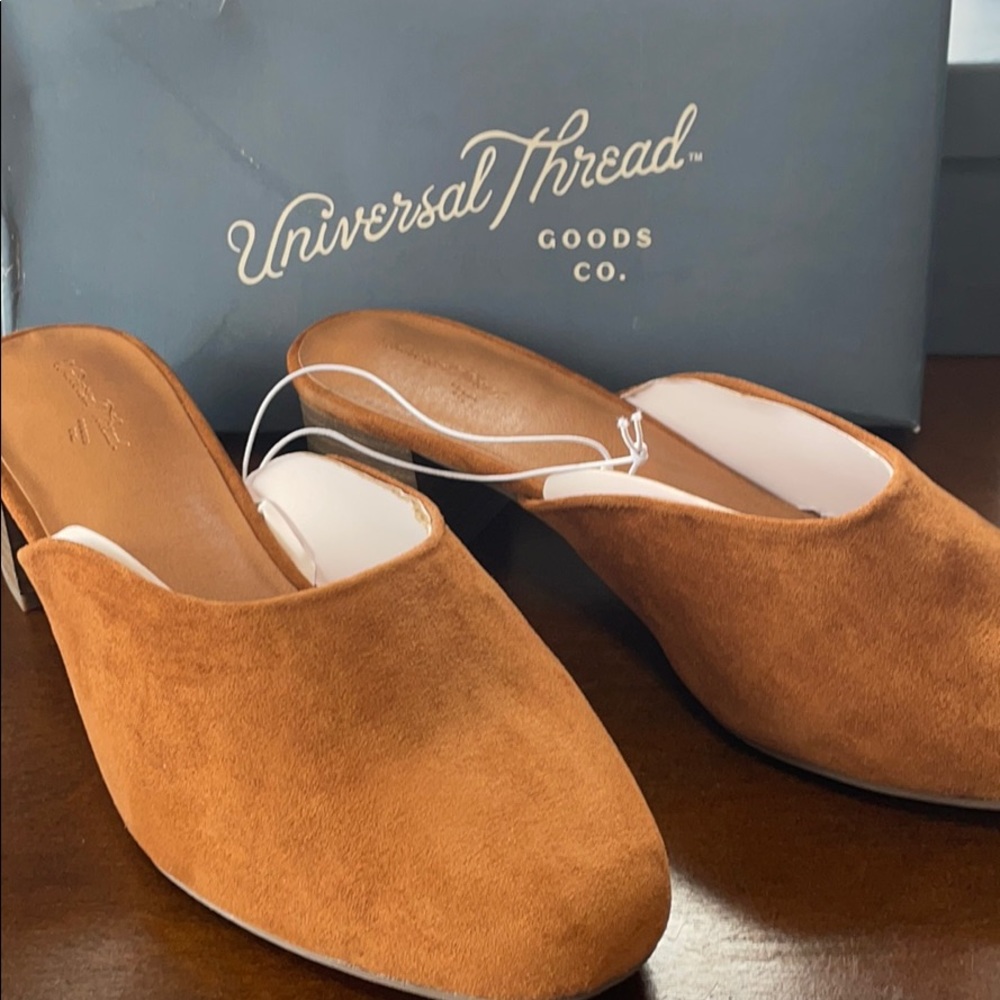 Never worn tan slip on heal